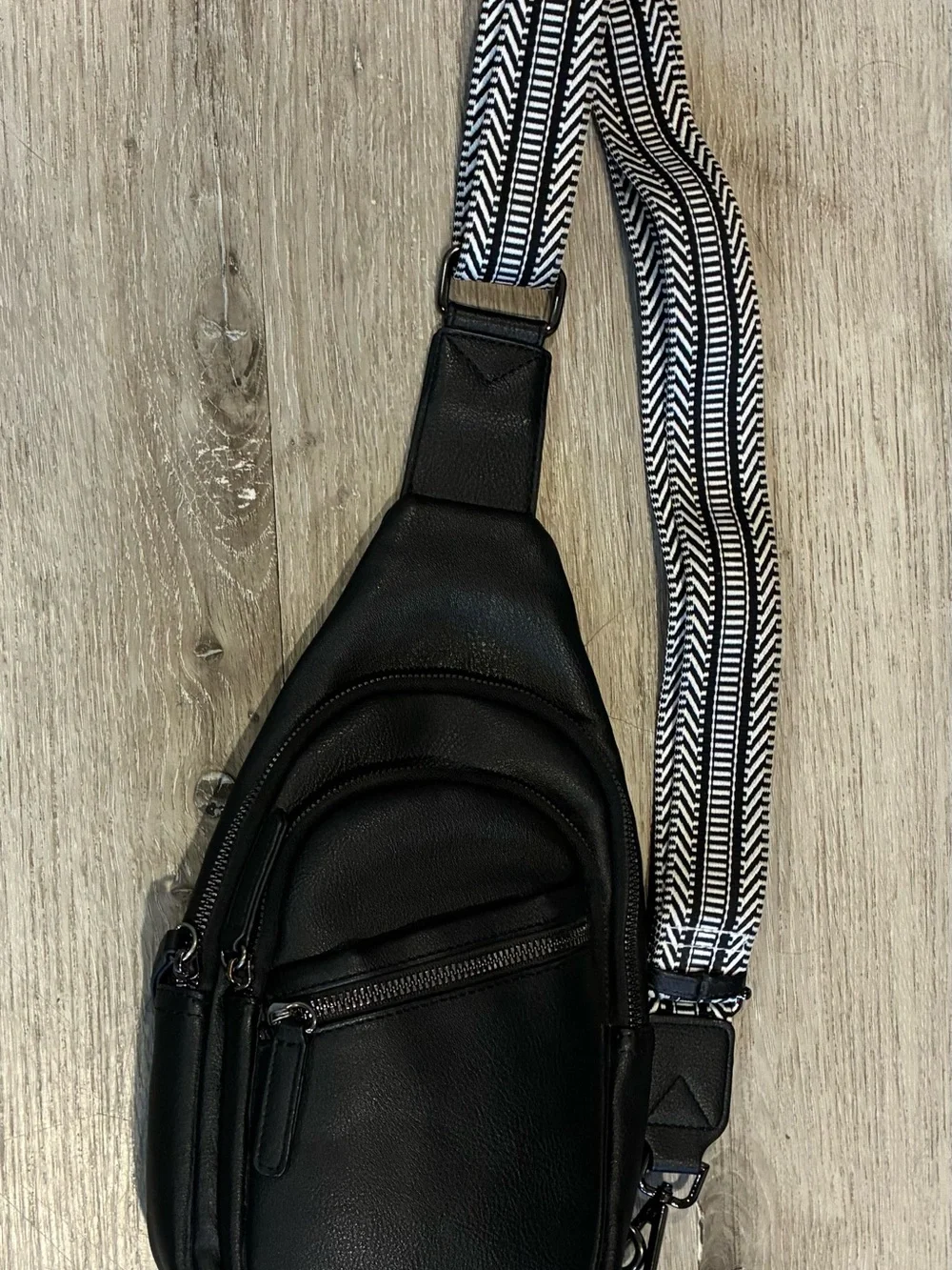 Black Crossbody Sling Bag with Patterned Strap